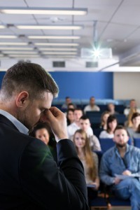 frustrated listener at conference